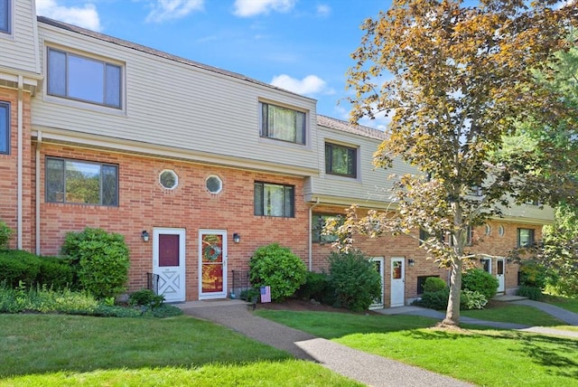 246 Farrwood Dr Unit 246, Haverhill, MA 01835 - view of property featuring a front yard and brick siding