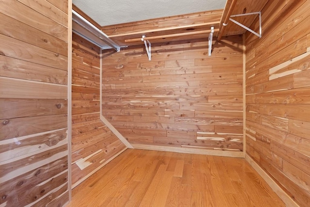 246 Farrwood Dr Unit 246, Haverhill, MA 01835 - walk in closet featuring wood finished floors