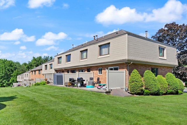 246 Farrwood Dr Unit 246, Haverhill, MA 01835 - back of property with brick siding