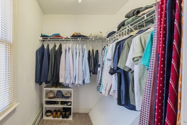 walk in closet featuring a baseboard radiator