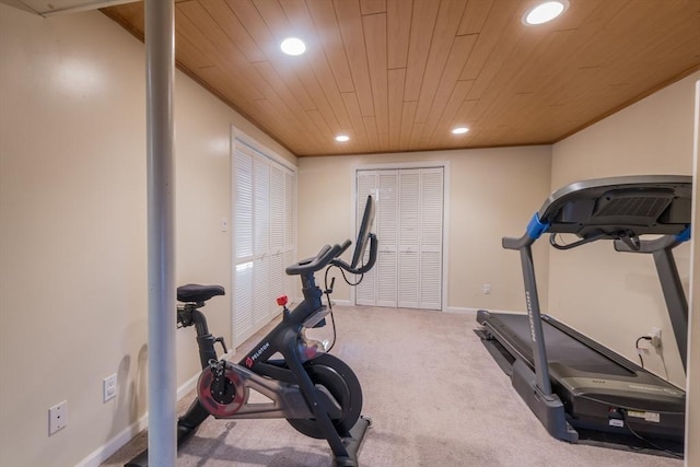 workout area with carpet, recessed lighting, wood ceiling, and baseboards