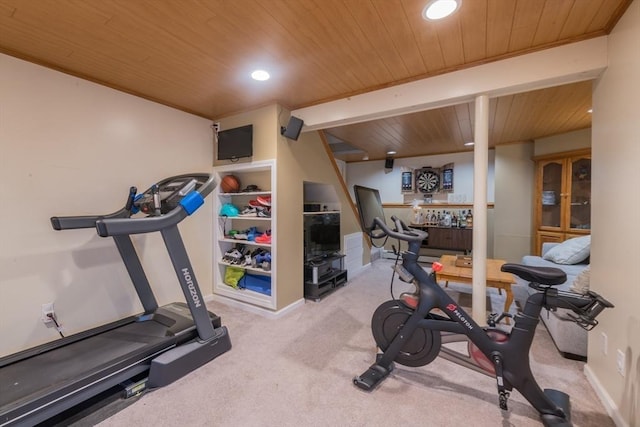 exercise room with recessed lighting, baseboards, carpet, and wood ceiling