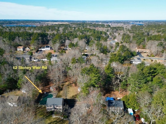 aerial view featuring a view of trees