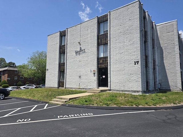 17 Skyline Dr Unit 3, Braintree, MA 02184 - view of building exterior featuring uncovered parking