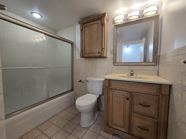 17 Skyline Dr Unit 3, Braintree, MA 02184 - full bath featuring tile walls, tile patterned flooring, shower / bath combination with glass door, and vanity