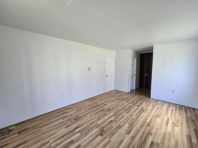 17 Skyline Dr Unit 3, Braintree, MA 02184 - empty room featuring wood finished floors and a textured ceiling