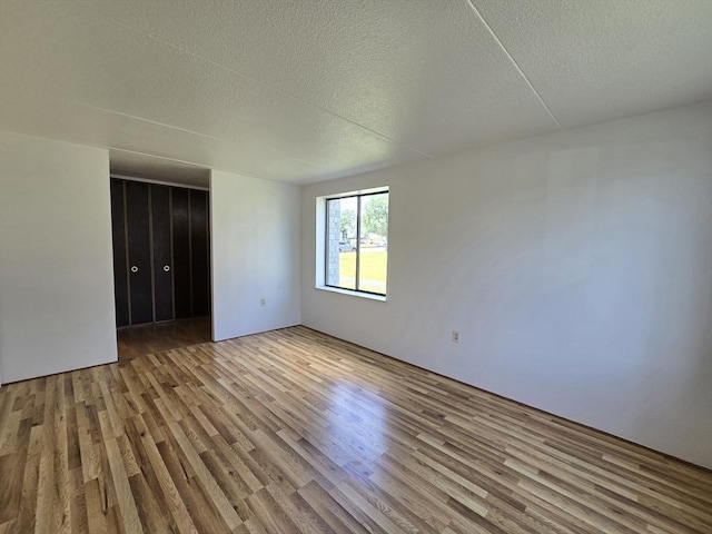 17 Skyline Dr Unit 3, Braintree, MA 02184 - empty room featuring wood finished floors and a textured ceiling