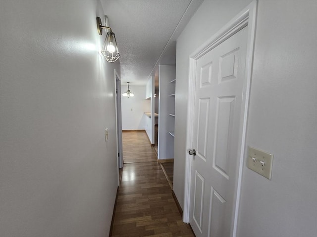 17 Skyline Dr Unit 3, Braintree, MA 02184 - corridor featuring a textured ceiling and dark wood-style floors