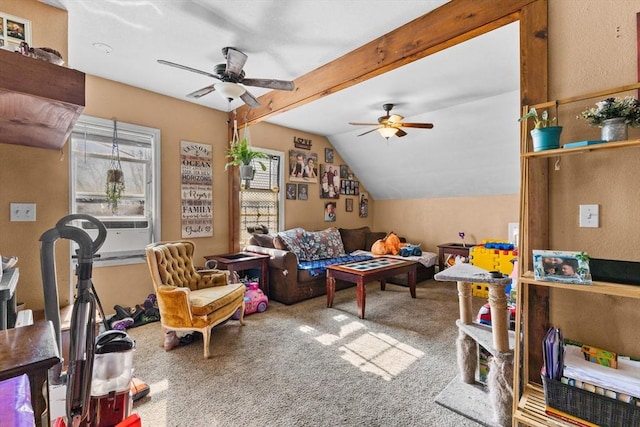 recreation room with lofted ceiling with beams, ceiling fan, cooling unit, carpet flooring, and plenty of natural light