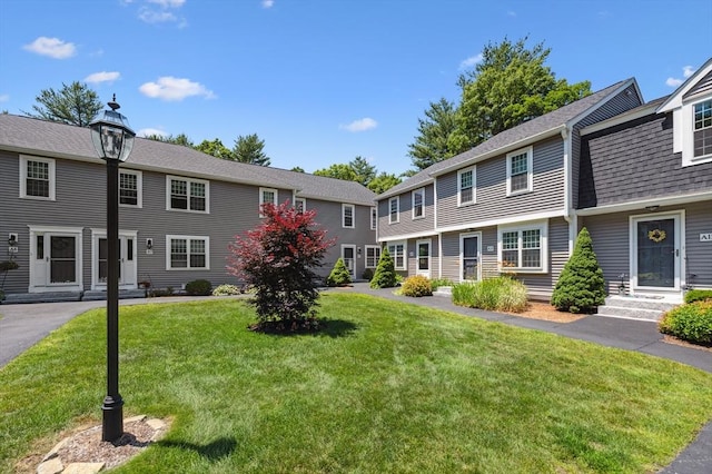 523 Washington St Unit A9, Pembroke, MA 02359 - view of front facade with a front lawn
