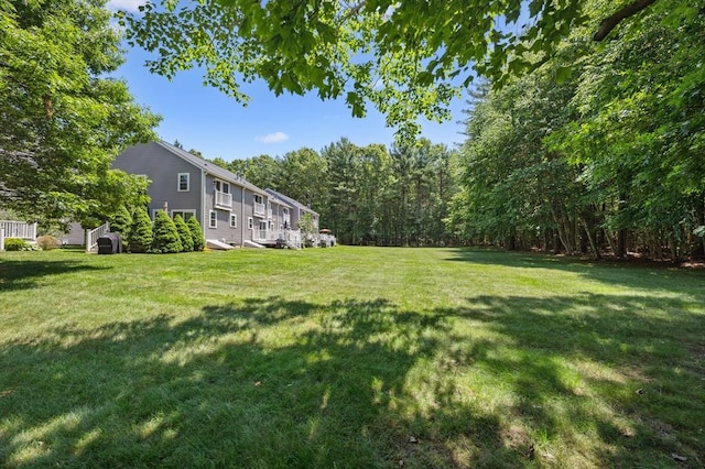 523 Washington St Unit A9, Pembroke, MA 02359 - view of green lawn with a forest view