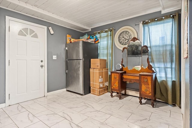 interior space featuring baseboards, a baseboard radiator, marble finish floor, and wooden ceiling