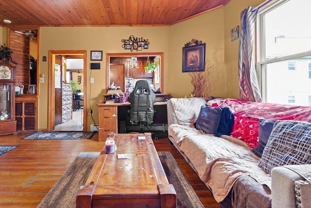 living room featuring plenty of natural light, wood finished floors, and wood ceiling