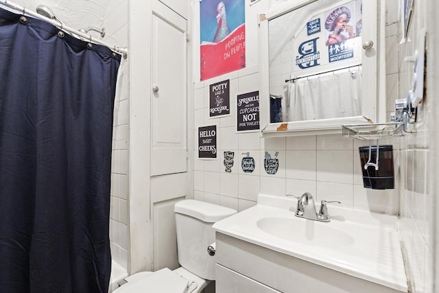 full bath featuring tasteful backsplash, vanity, curtained shower, toilet, and tile walls