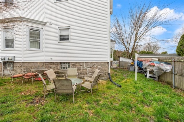 view of yard featuring fence