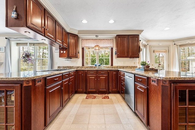 kitchen with recessed lighting, light stone countertops, stainless steel appliances, light tile patterned floors, and a peninsula