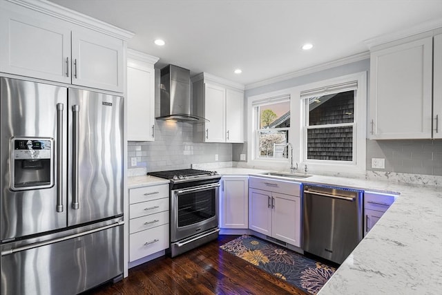 131 Dorchester St Unit 131, Quincy, MA 02171 - kitchen featuring stainless steel appliances, a sink, wall chimney exhaust hood, crown molding, and backsplash