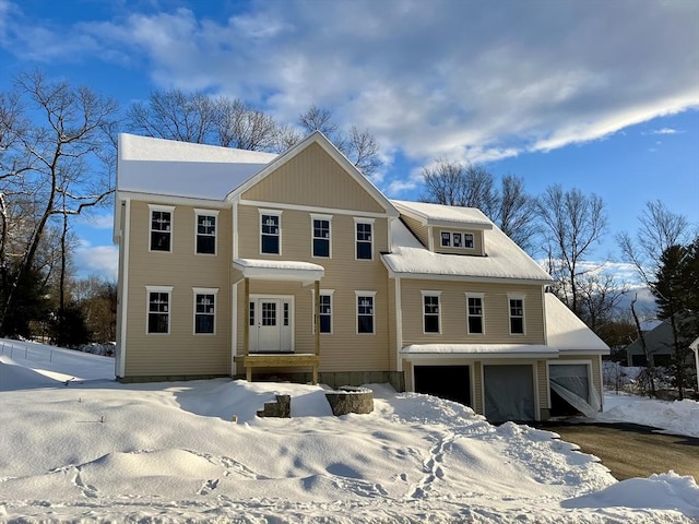 colonial home with a garage