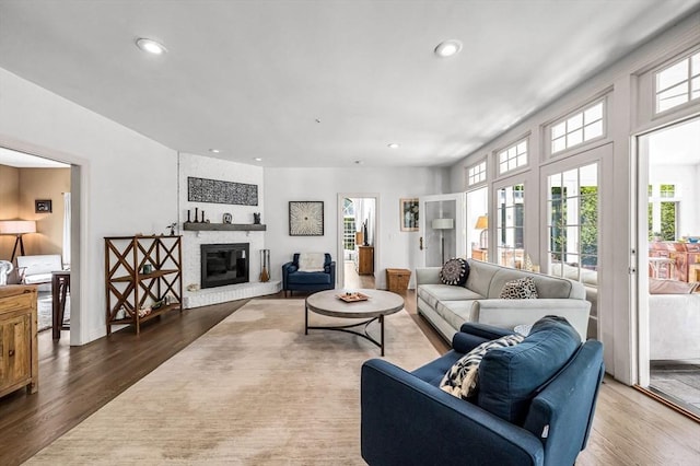 1 Webster Ln, Wilbraham, MA 01095 - living room featuring recessed lighting, healthy amount of natural light, a fireplace, and wood finished floors