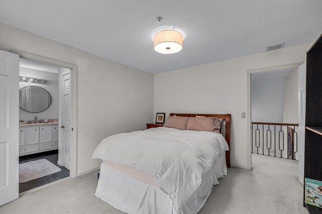 1 Webster Ln, Wilbraham, MA 01095 - bedroom featuring light colored carpet, a sink, ensuite bath, and baseboards
