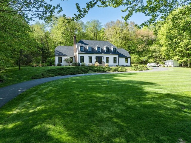 1 Webster Ln, Wilbraham, MA 01095 - cape cod house with a front lawn and a chimney