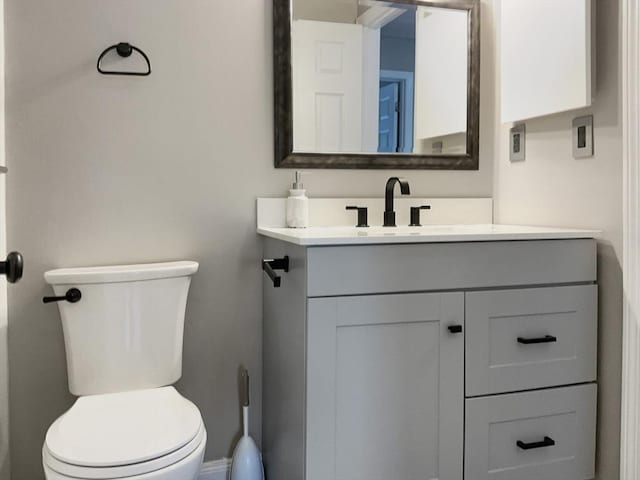 half bath with toilet and vanity