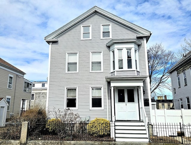 view of front of home with fence