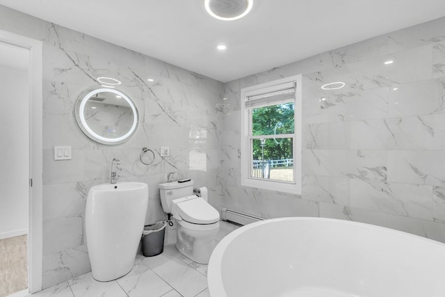 bathroom featuring tile walls, toilet, and a baseboard heating unit