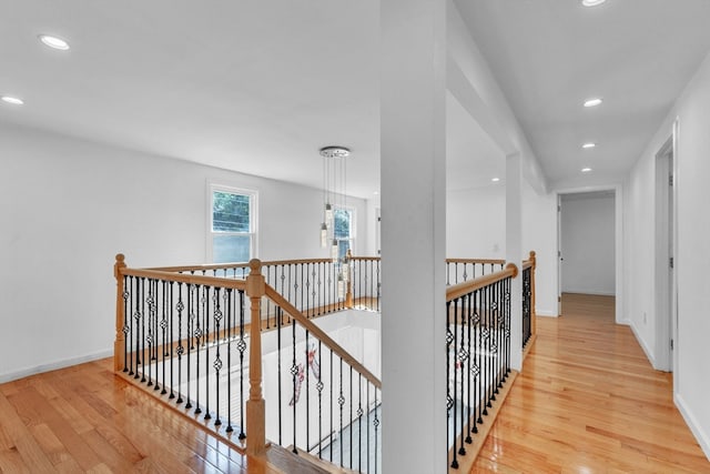 hall with light wood-type flooring