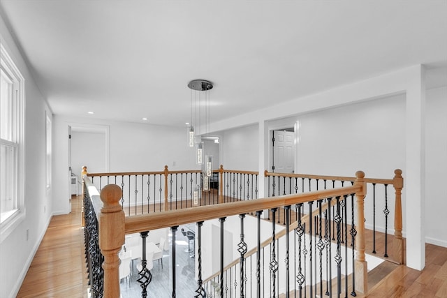 hall with light hardwood / wood-style flooring