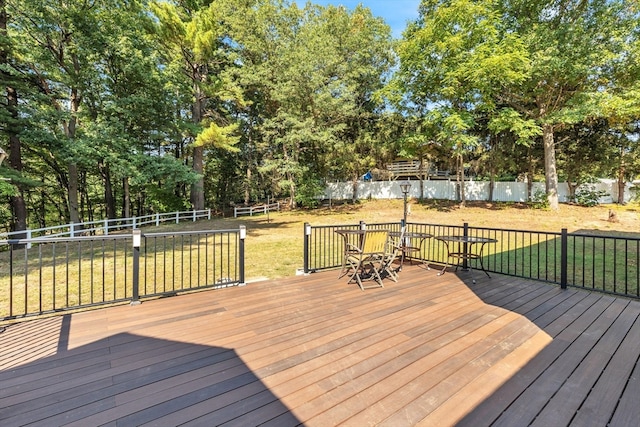 deck featuring a lawn