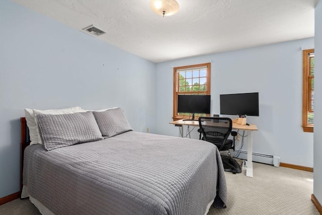 23 Lafayette Dr, Walpole, MA 02032 - bedroom with carpet flooring and a baseboard heating unit