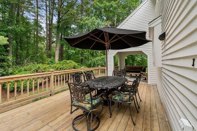 23 Lafayette Dr, Walpole, MA 02032 - wooden deck featuring outdoor dining space and view of scattered trees