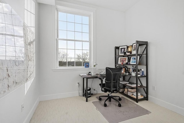 home office featuring a wealth of natural light