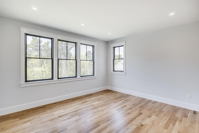 92 Whiffletree Ave, Brewster, MA 02631 - empty room featuring light wood-style flooring, baseboards, and recessed lighting