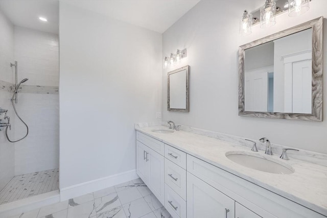 92 Whiffletree Ave, Brewster, MA 02631 - bathroom featuring double vanity, marble look tiles, walk in shower, baseboards, and recessed lighting