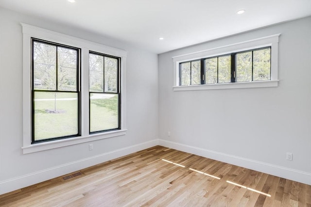 92 Whiffletree Ave, Brewster, MA 02631 - unfurnished room with baseboards, wood finished floors, and recessed lighting