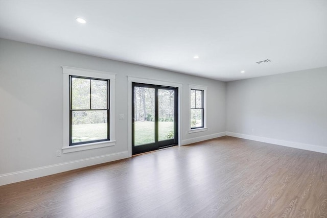 92 Whiffletree Ave, Brewster, MA 02631 - unfurnished room featuring wood finished floors, baseboards, and recessed lighting