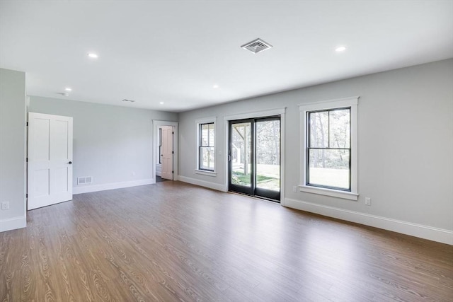 92 Whiffletree Ave, Brewster, MA 02631 - spare room with wood finished floors, baseboards, and recessed lighting