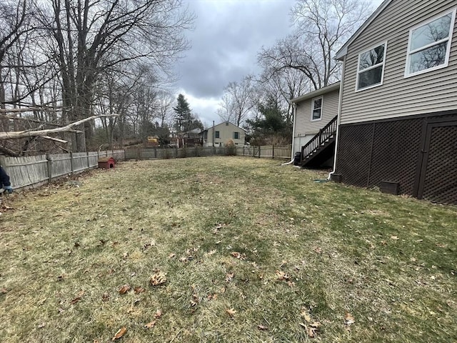 view of yard featuring a fenced backyard