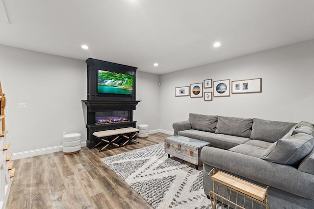 6 Jacoby Way, Seekonk, MA 02771 - living area with wood finished floors, recessed lighting, and a large fireplace