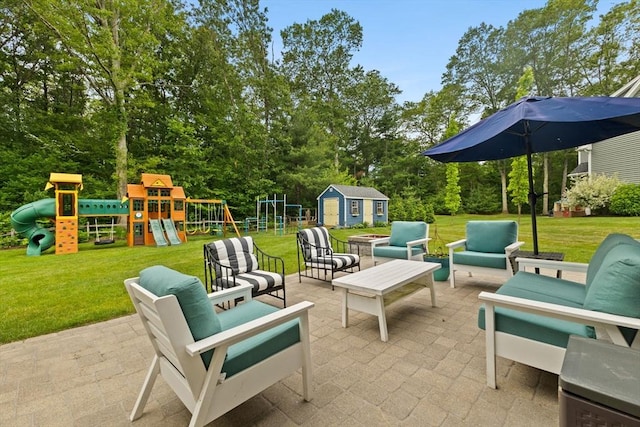 6 Jacoby Way, Seekonk, MA 02771 - view of patio with an outdoor living space, a playground, a storage unit, and view of wooded area