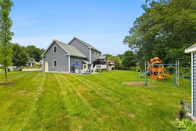 6 Jacoby Way, Seekonk, MA 02771 - view of grassy yard featuring a playground and a wooden deck
