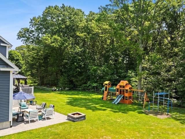6 Jacoby Way, Seekonk, MA 02771 - view of grassy yard featuring a playground, an outdoor fire pit, a gazebo, and a patio area