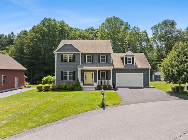 6 Jacoby Way, Seekonk, MA 02771 - colonial-style house with covered porch, driveway, a front yard, and an attached garage