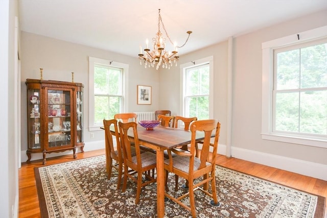 37 Pemberton Rd, Wayland, MA 01778 - dining space featuring healthy amount of natural light, a chandelier, and light wood finished floors