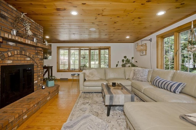 60 Daniel Shays Hwy, Pelham, MA 01002 - living room with wood ceiling, plenty of natural light, a brick fireplace, light wood-style flooring, and recessed lighting