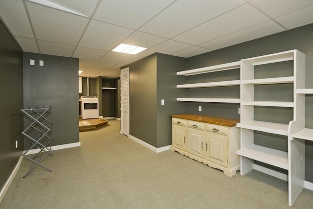 60 Daniel Shays Hwy, Pelham, MA 01002 - finished basement featuring a paneled ceiling, washer / dryer, a wood stove, and light carpet