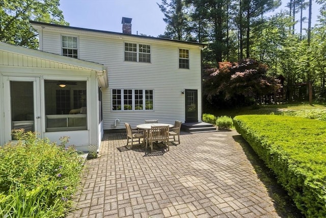 60 Daniel Shays Hwy, Pelham, MA 01002 - rear view of property with a patio area, a chimney, and outdoor dining space