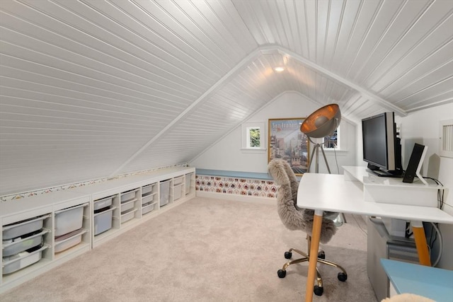 office area featuring vaulted ceiling and carpet flooring